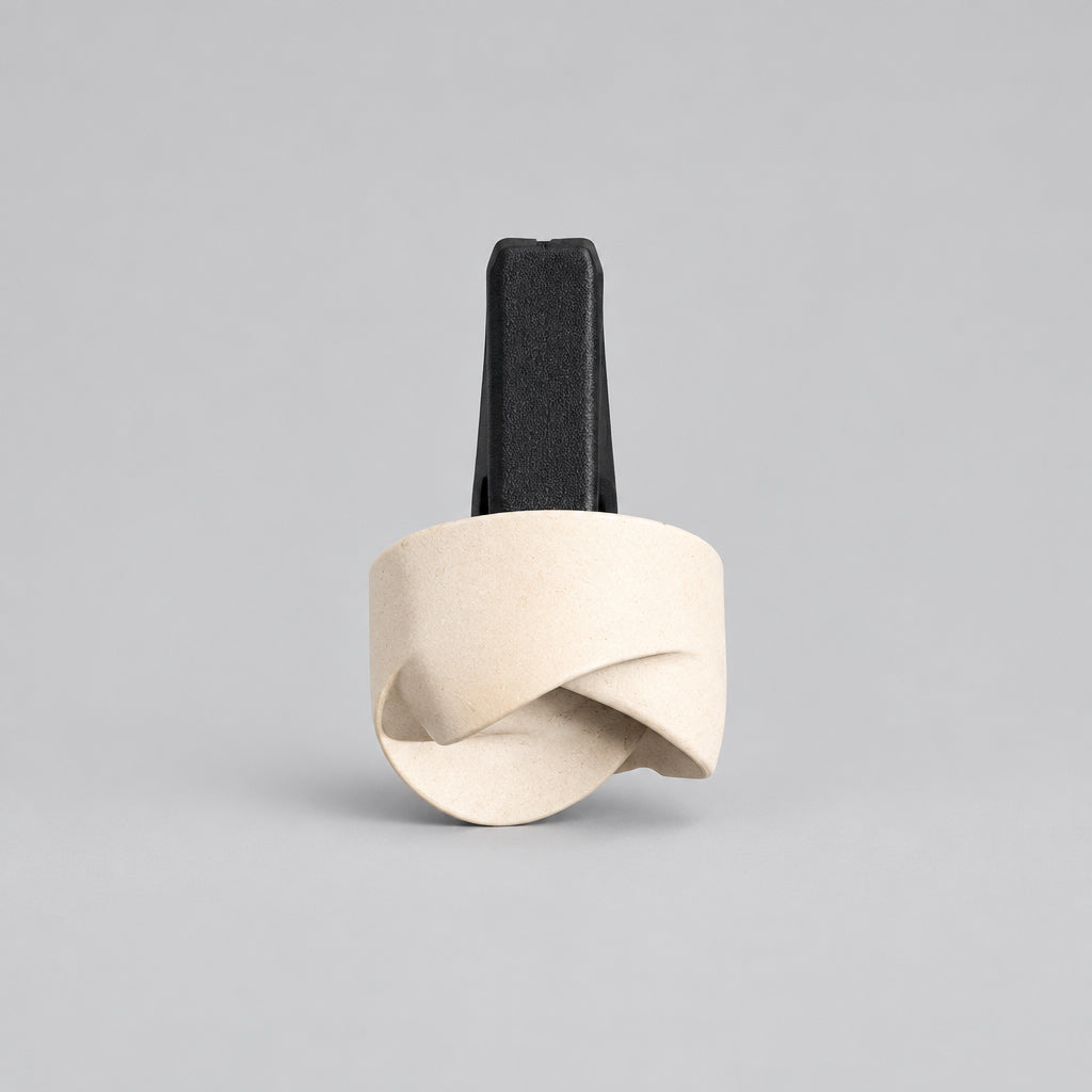 A small white and black clip.